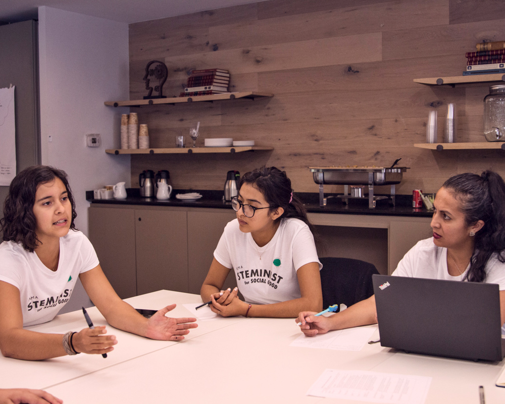 Group of girls discussing STEM