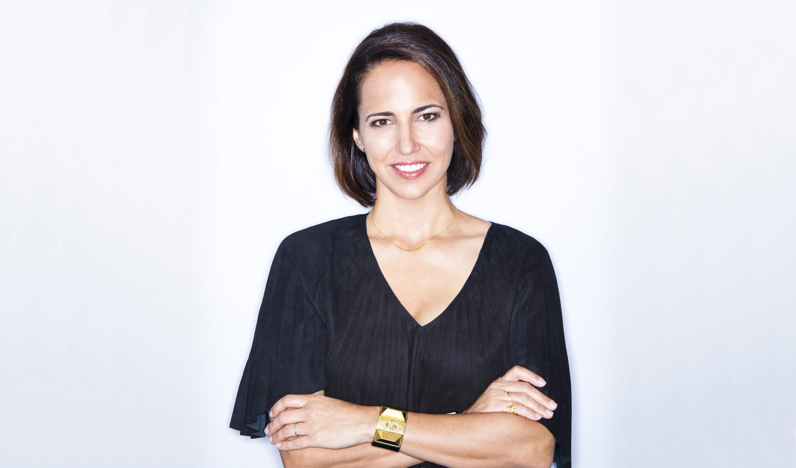 Advisory Council Anne Fulenwider (upper body headshot) pose with her hands cross , white background