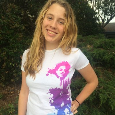 Fidelity Ballmer_ 2015-2016 Teen Advisors (half body, close angle headshot) with her smiley face facing the camera, with background greenery