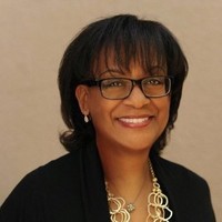 Advisory Council Karen Miller headshot and little blurry picture with grey background