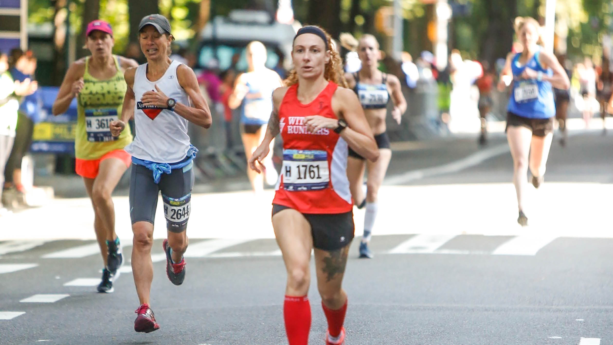 Rebekah Kennedy is running the marathon and she appears ahead of other women runners