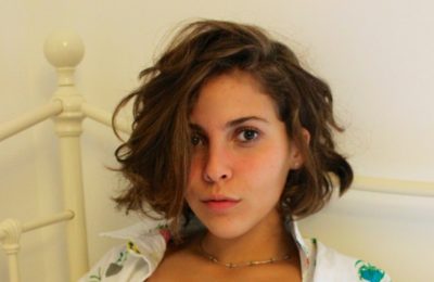 Sarra Alayyan_2016-2017 Teen Advisors (close headshot, a little blurry) a selfie with her smiley face facing the camera