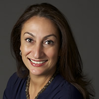 Advisory Council Zain Habboo professional head shot, blurry picture with grey background