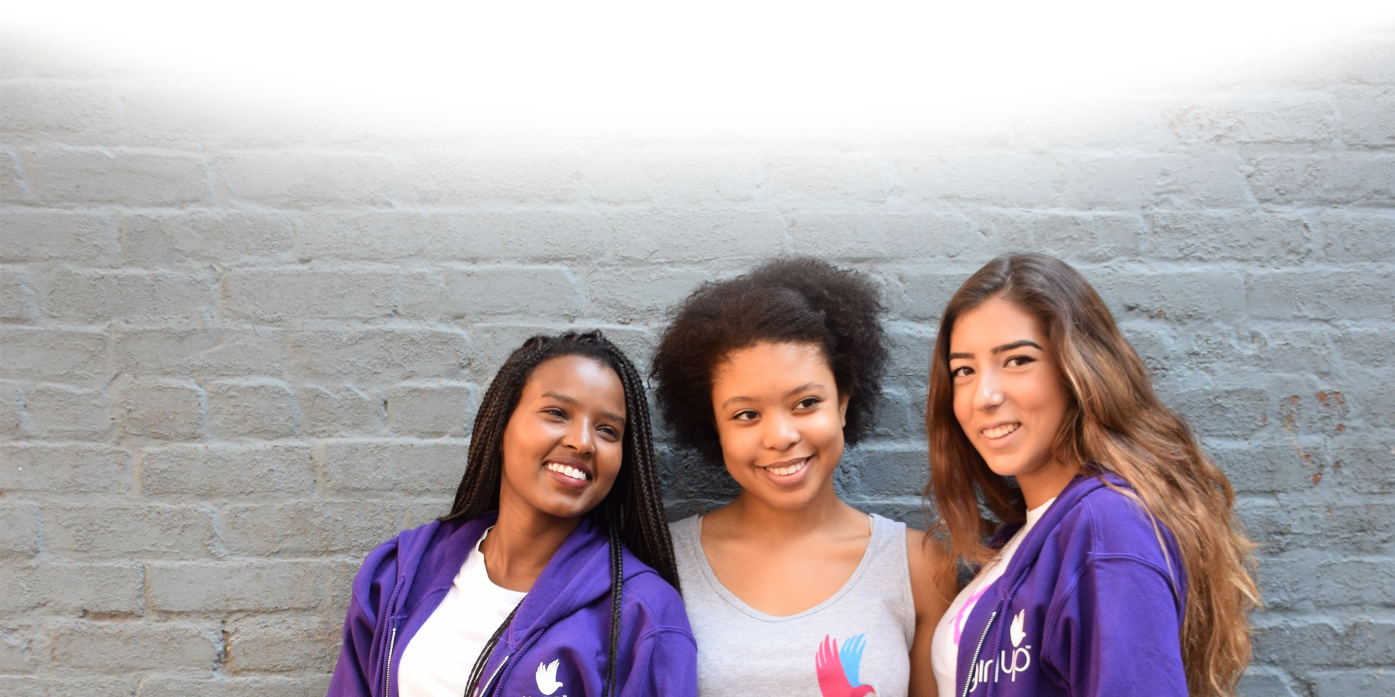3 Girl Up girls with girl up t-shirt on (group picture)