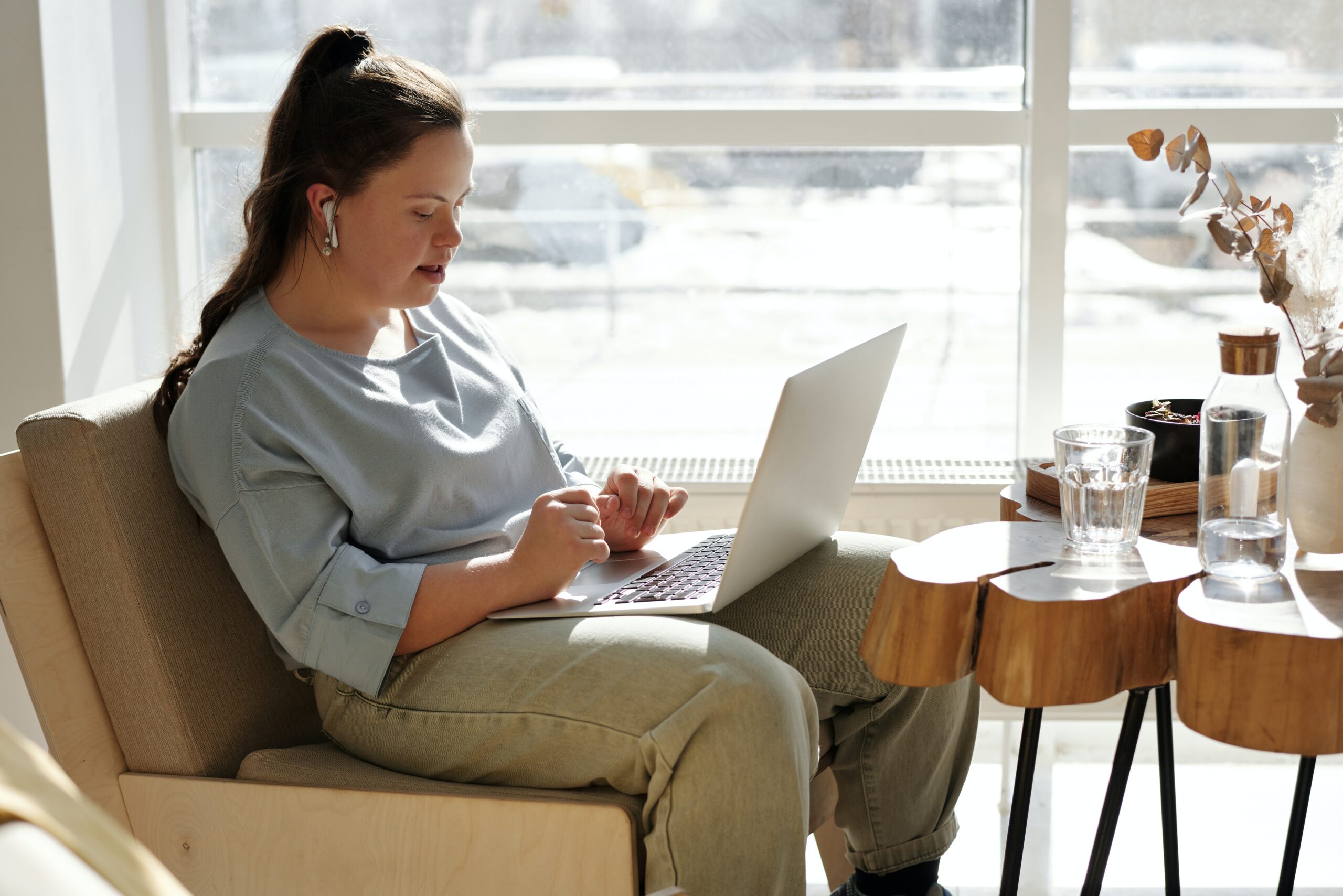 A young woman working on her laptop